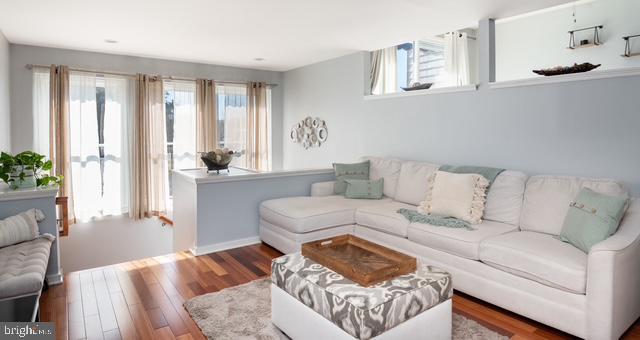 living area featuring wood finished floors