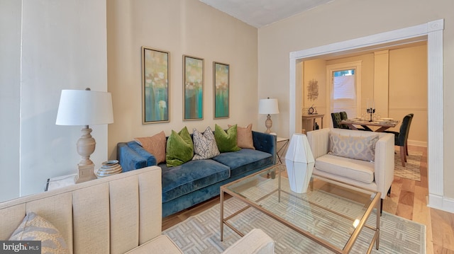 living room with wood finished floors