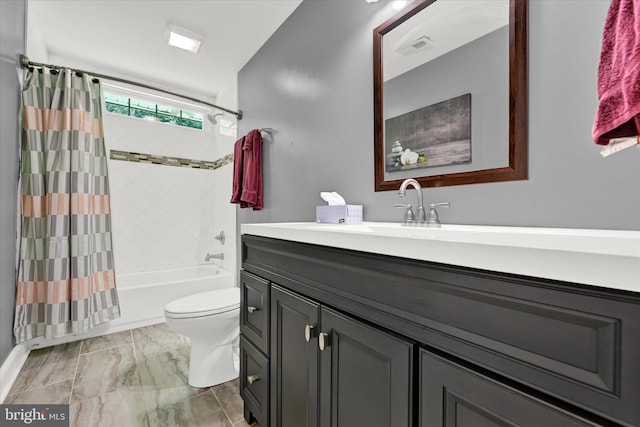 full bathroom featuring marble finish floor, visible vents, toilet, shower / tub combo, and vanity