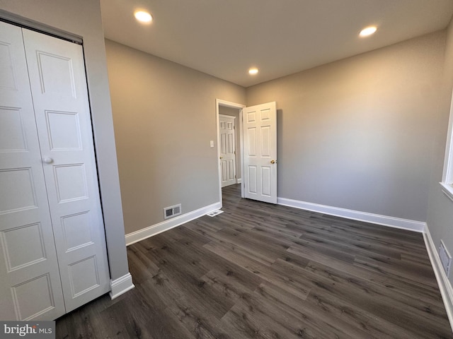 unfurnished bedroom featuring recessed lighting, visible vents, and baseboards