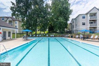 community pool with a patio