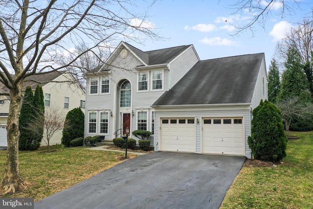 view of front facade with aphalt driveway, an attached garage, a shingled roof, and a front lawn