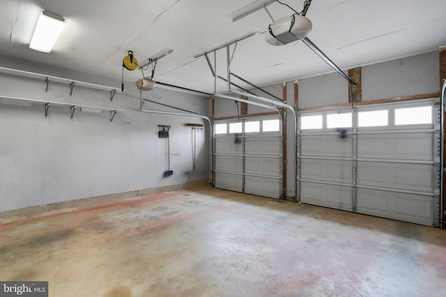 garage featuring a garage door opener