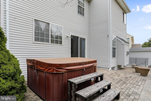 view of patio featuring a hot tub