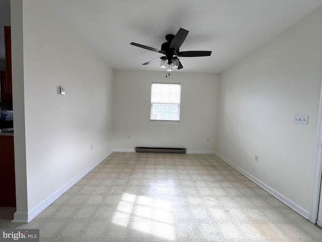 spare room featuring tile patterned floors, ceiling fan, a baseboard heating unit, and baseboards