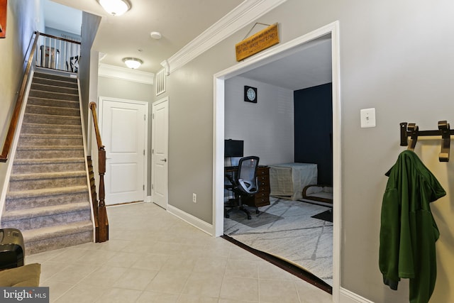 interior space with light tile patterned flooring, stairs, crown molding, and baseboards