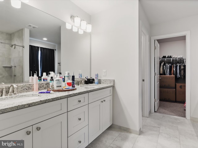 196 Kelley Rd, Fredericksburg, VA 22405 - bathroom with a sink, visible vents, a stall shower, and double vanity