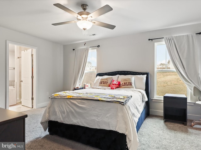 196 Kelley Rd, Fredericksburg, VA 22405 - carpeted bedroom featuring a ceiling fan, baseboards, visible vents, and connected bathroom