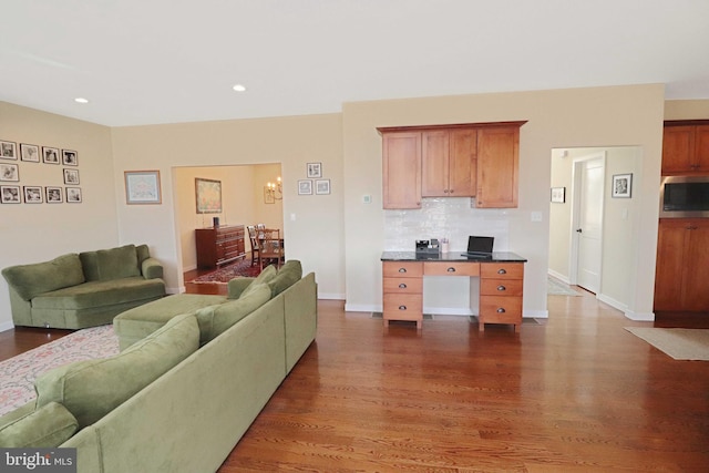 living room with recessed lighting, dark wood-style flooring, and baseboards