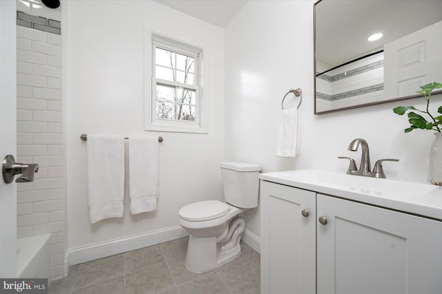 bathroom with toilet, recessed lighting, vanity, baseboards, and tile patterned floors