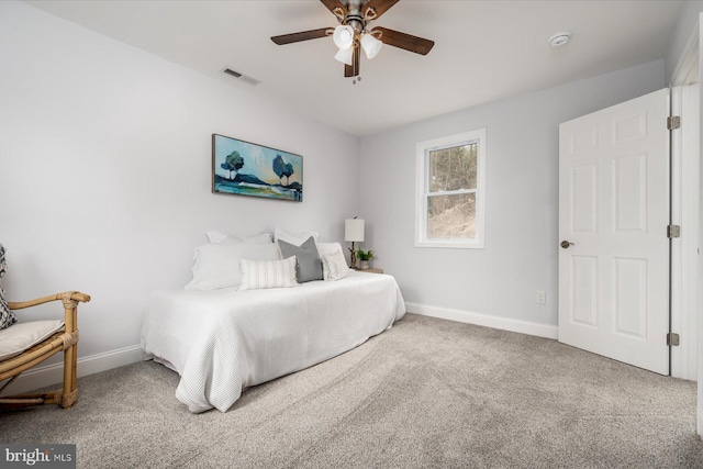 bedroom featuring carpet, visible vents, ceiling fan, and baseboards