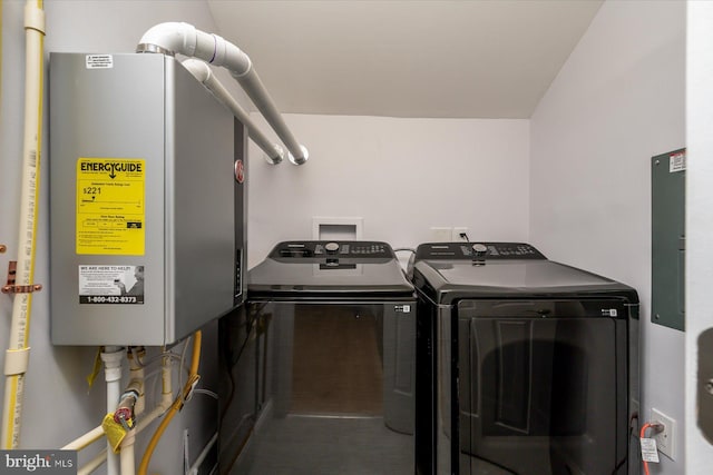 laundry room with laundry area and washing machine and clothes dryer