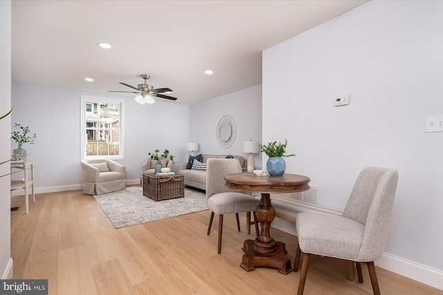 living area featuring visible vents, recessed lighting, light wood-style flooring, and baseboards