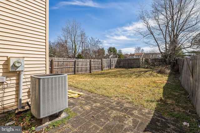 view of yard featuring cooling unit and a fenced backyard