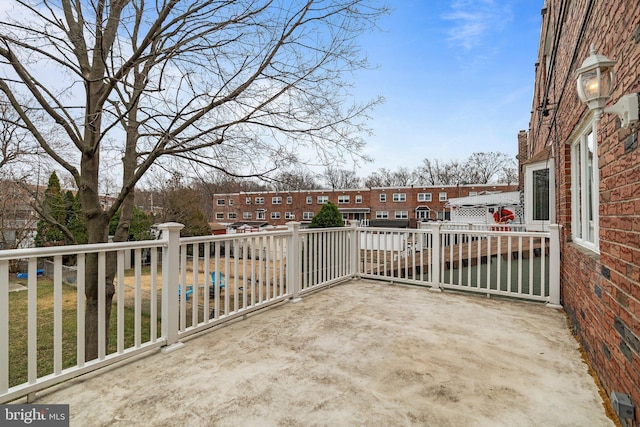 balcony featuring a residential view and a patio area