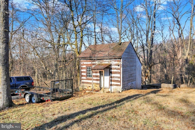 view of outbuilding with an outbuilding