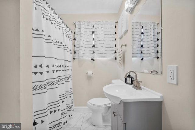 bathroom with toilet, marble finish floor, a shower with curtain, and vanity