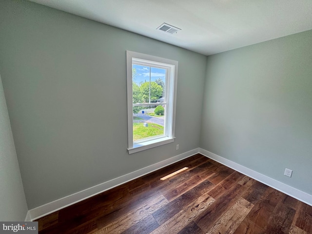 419 Kentmorr Rd, Stevensville, MD 21666 - empty room featuring baseboards and dark wood-style floors