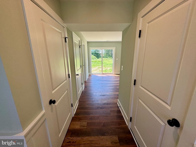 419 Kentmorr Rd, Stevensville, MD 21666 - corridor with dark wood-style flooring and baseboards