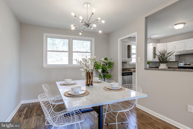 dining area featuring a chandelier, baseboards, and dark wood-style flooring