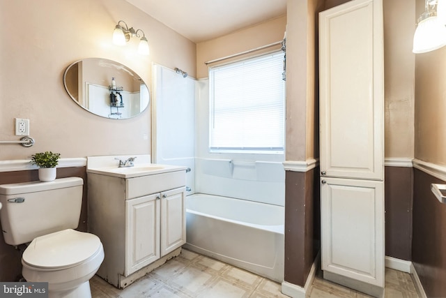 bathroom featuring tile patterned floors, toilet, a bathing tub, walk in shower, and vanity