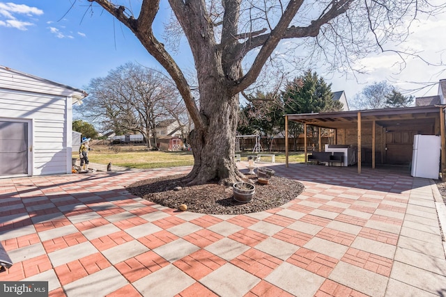 view of patio / terrace with fence