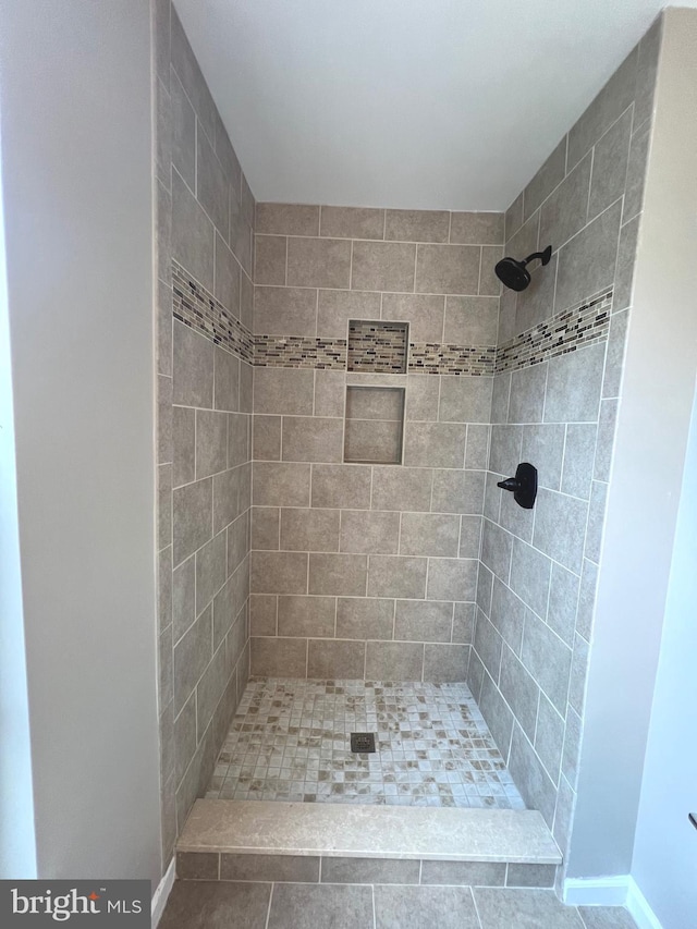full bathroom with a shower stall