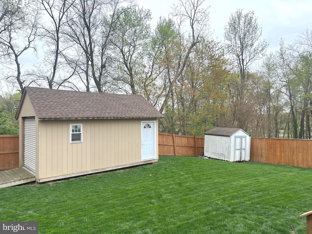 view of shed featuring a fenced backyard