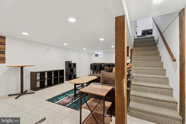 stairway with tile patterned flooring, recessed lighting, and baseboards