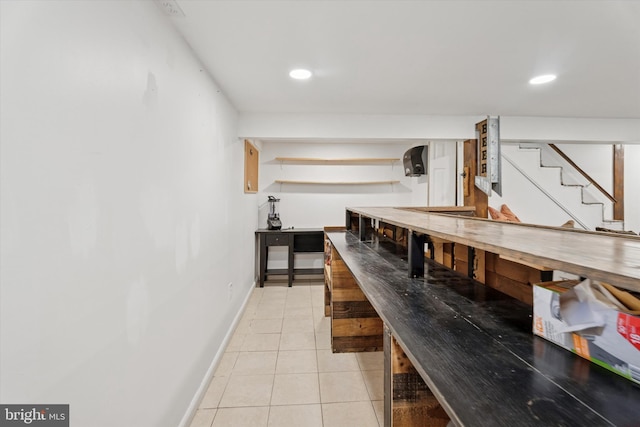 bar with stairway, light tile patterned floors, recessed lighting, and baseboards