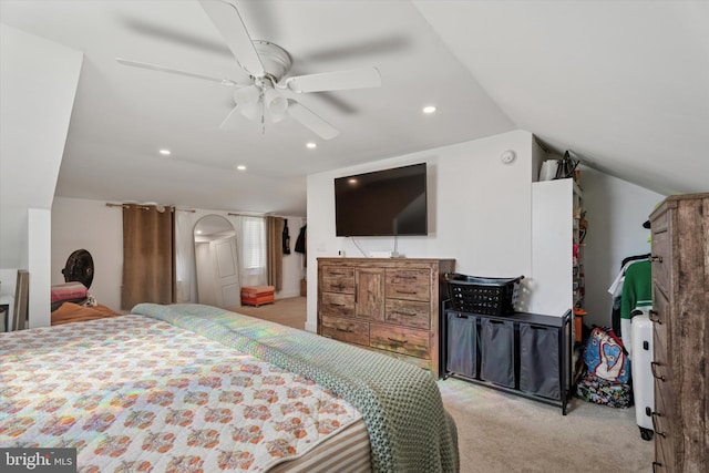 bedroom featuring a ceiling fan, vaulted ceiling, recessed lighting, and light carpet