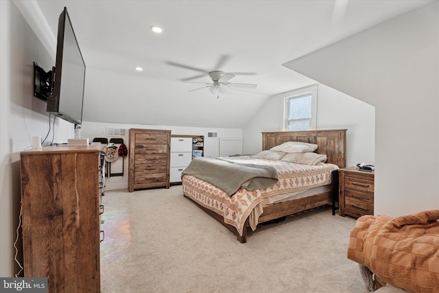 bedroom with visible vents, recessed lighting, ceiling fan, vaulted ceiling, and light carpet