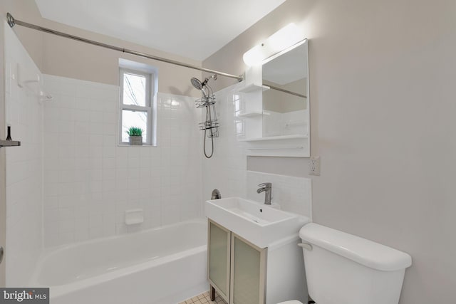 full bathroom with  shower combination, a sink, and toilet