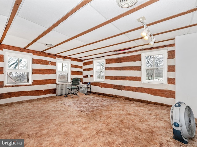 unfurnished office featuring visible vents and carpet flooring