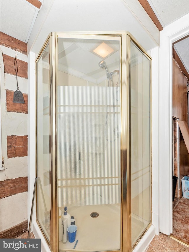 full bathroom featuring a shower stall