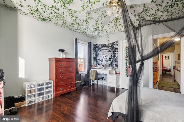 bedroom with wood finished floors