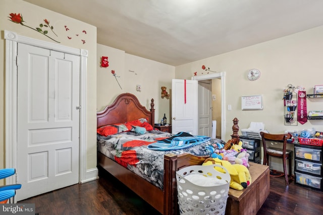 bedroom with wood finished floors