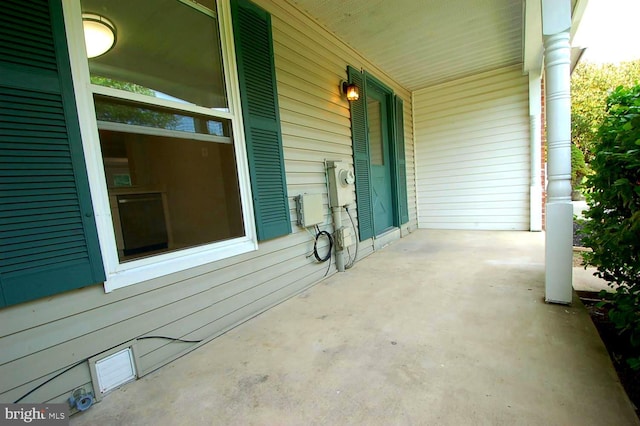 view of patio featuring a porch