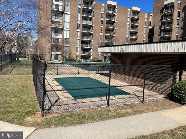 view of pool with fence