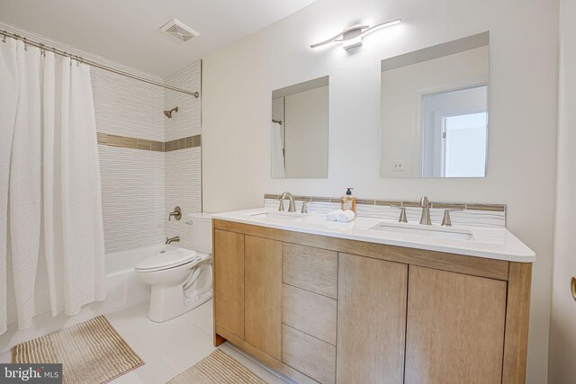 full bathroom featuring a sink, visible vents, double vanity, and shower / bath combination with curtain