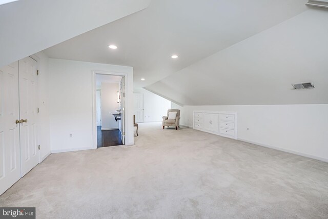 bonus room with visible vents, recessed lighting, baseboards, carpet floors, and lofted ceiling