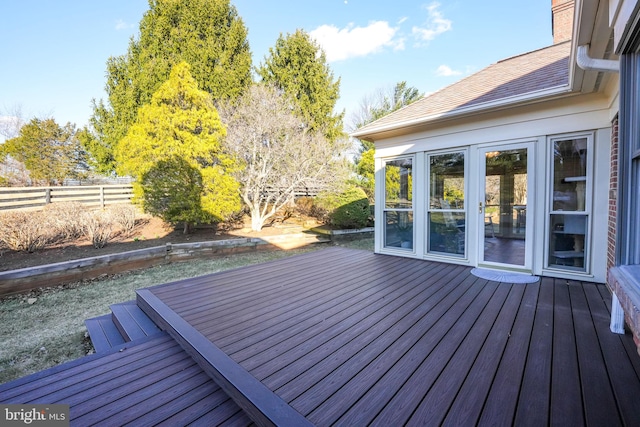 wooden deck featuring fence