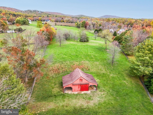 bird's eye view with a rural view and a mountain view