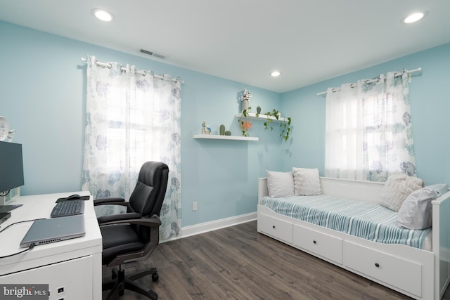 interior space featuring visible vents, recessed lighting, dark wood-type flooring, and baseboards