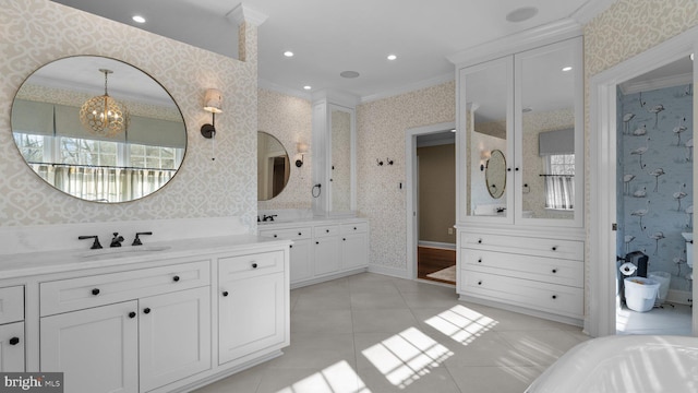 full bath featuring wallpapered walls, crown molding, vanity, and tile patterned flooring