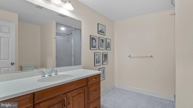 full bathroom featuring visible vents, walk in shower, baseboards, toilet, and vanity