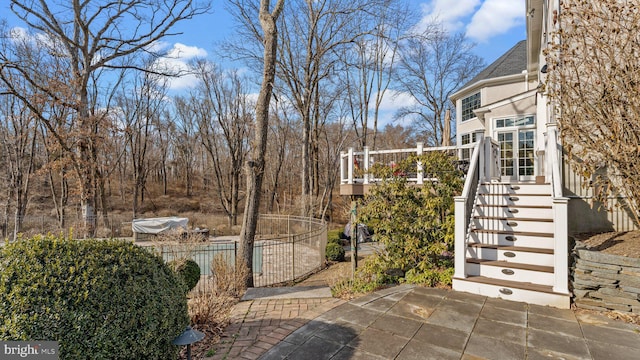 exterior space featuring a patio area and stairway