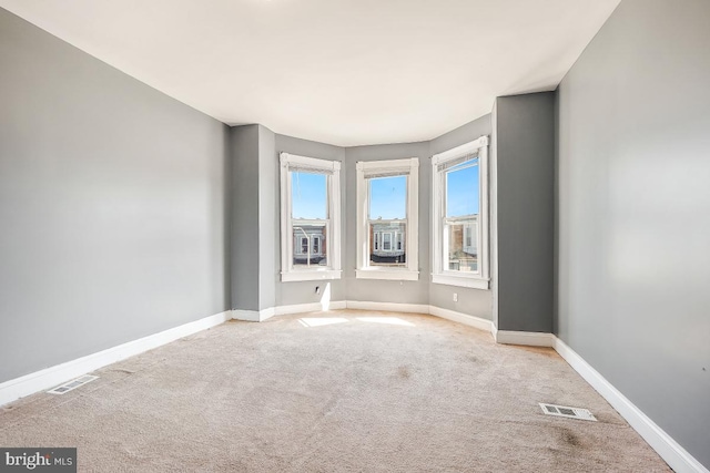 1636 N Bentalou St, Baltimore, MD 21216 - empty room with visible vents, baseboards, and carpet flooring