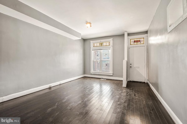 1636 N Bentalou St, Baltimore, MD 21216 - empty room with baseboards and hardwood / wood-style flooring