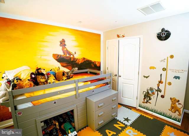 bedroom featuring visible vents